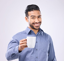 Image showing Business man, coffee cup toast and studio portrait with smile, motivation and start morning by background. Happy asian businessman, drink and cheers for success, focus and energy for job by backdrop