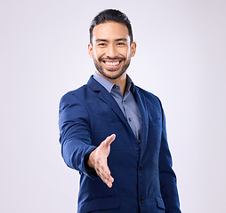 Image showing Business man, handshake and studio portrait for welcome, smile or agreement for partnership by background. Asian young entrepreneur, shaking hands or excited face for opportunity, greeting or respect