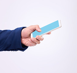 Image showing Man, hand and phone with green screen in studio for communication or network connection on website. Hands of male with smartphone for internet search, mobile app or mockup chat on a white background