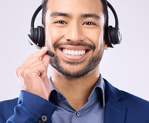 Image showing Call center portrait of happy man isolated on a white background in headset for telecom or global support. Face of international agent, consultant or salesman business person virtual career in studio