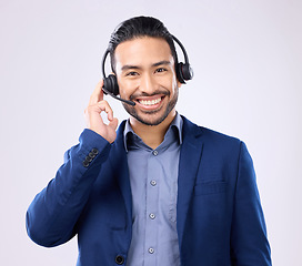 Image showing Headset portrait of happy man isolated on a white background call center, telecom job or global support. International callcenter agent, consultant or business person face in studio communication