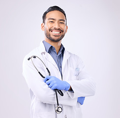 Image showing Healthcare, doctor and Asian man with stethoscope, portrait and management on a studio white background. Face, happy consultant and confident medical professional with tool, wellness and motivation