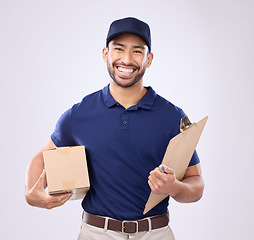 Image showing Portrait of delivery man isolated on studio background courier services, supply chain and clipboard checklist. Asian worker, business or logistics person with package in Korea distribution of product