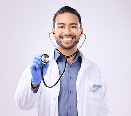 Image showing Medical doctor, portrait man or stethoscope for support on healthcare, nurse work or clinic cardiology. Wellness service, studio or happy person with heart beat listening equipment on gray background