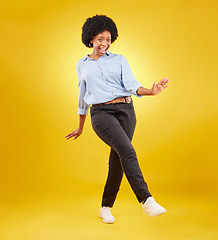 Image showing Dance, excited and happy black woman on yellow background with motivation, dancing and smile. Winner mockup, wow portrait and isolated full body of girl for freedom, winning and success in studio