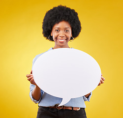 Image showing Portrait, speech bubble and happy black woman in studio with mockup for social media, advertising or space. Face, poster and girl with billboard on news, announcement or branding on yellow background