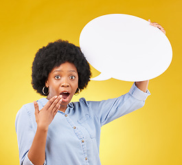 Image showing Speech bubble, portrait and wow by black woman in studio with mockup for social media, advertising or space. Face, poster and shocked girl with billboard for news or announcement on yellow background