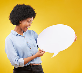 Image showing Smile, speech bubble and happy black woman in studio with mockup for social media, advertising or space. Blank, poster and girl with billboard for news, announcement or branding on yellow background