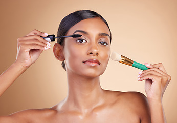 Image showing Makeup brush, portrait or woman with beauty mascara, facial products or luxury self care on studio background. Model face or young Indian girl with cosmetics or natural glowing skincare application