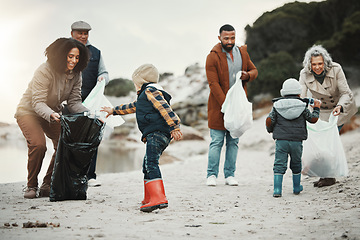 Image showing Garbage, beach cleaning and children, family or volunteering group in education, learning and community service. Grandparents, people and kids helping with plastic waste for pollution on earth day