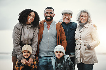 Image showing Portrait, happy and extended family or excited people bonding spending quality time together on holiday. Beach, winter and trip by grandparents with children and parents with kids at sea for getaway