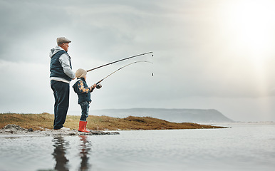 Image showing Lake, nature and grandfather fishing with a child learning on an adventure, holiday or weekend trip. Hobby, outdoor and elderly man teaching kid to catch fish on a vacation by a river with mockup