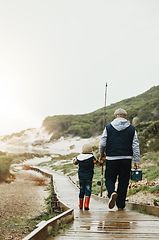 Image showing Walking, fishing and grandfather with child outdoor for lesson, leisure activity or hobby. Travel, bonding and back of senior man with kid to teach him to catch fish while on vacation or weekend trip