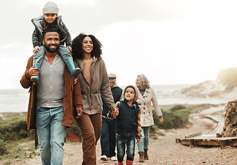 Image showing Family hiking outdoor in nature, happiness and bonding, spending quality time together with fitness and generations. Grandparents, parents and children walking, love and care with happy people