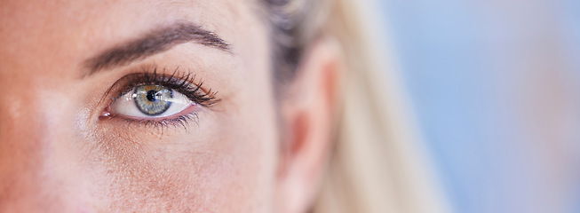 Image showing Eye closeup portrait, woman and mockup space with blurred background for vision, wellness and healthy lens. Beauty, optometry zoom and mock up with cosmetics, makeup eyes and biometric cybersecurity