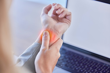 Image showing Business woman, wrist injury and red pain from osteoporosis, orthopedic joint and laptop typing in office. Worker, carpal tunnel and hands of health risk, arthritis and muscle fatigue of fibromyalgia