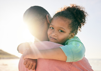 Image showing Beach, black father and hug child with love, embrace and bond on outdoor vacation for peace, freedom and quality time. Sunshine flare, portrait and family youth kid, dad or people together in Jamaica