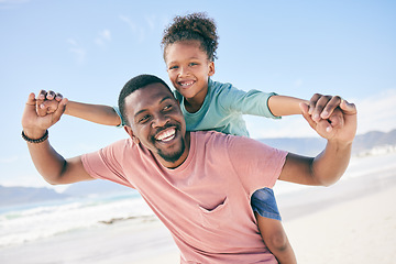 Image showing Child, black man and piggy back at ocean on playful family holiday in Australia with freedom, fun and energy. Travel, fun and happy father and girl with smile playing and bonding together on vacation