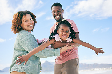 Image showing Portrait, fly or girl with parents at beach on summer holiday vacation or weekend together as a happy family. African father, fun mother or excited child love bonding, relaxing or playing in nature