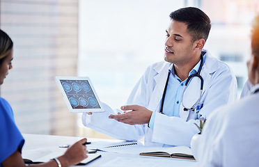 Image showing Tablet xray, man and doctors in radiology planning for test, results charts and healthcare analysis meeting. Medical team, hospital and digital x ray of skull, anatomy and review neurology technology