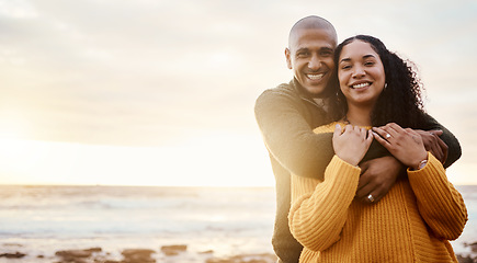 Image showing Hug, happy and portrait of a couple at the beach for a date, bonding or sunset in Bali. Love, embrace and young man and woman smiling while relaxing at the ocean for vacation with mockup space