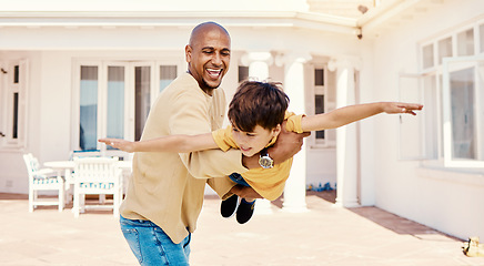 Image showing Playing, flying and smile of a child with a father for freedom, imagination or bonding. Happy, play and carefree dad holding boy kid to pretend to fly, adventure and happiness together at home