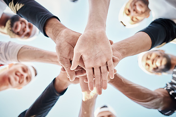 Image showing Hands, baseball motivation or sports men in huddle with support, hope or faith on field in fun game together. Teamwork, happy people or group of excited softball athletes with solidarity low angle