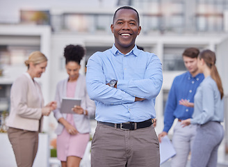 Image showing Business people, leadership and portrait of black man outside office with smile and confidence on break from work. Manager, ceo and boss with employees networking and b2b with human resources team.