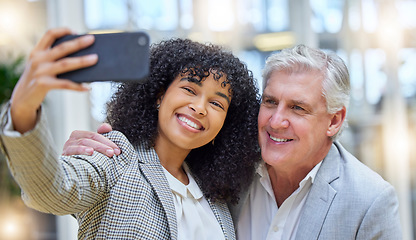 Image showing Selfie, smile and colleagues or business people taking a picture in an office feeling happy for a partnership. Online, about us and woman takes photo with man to update startup company social media