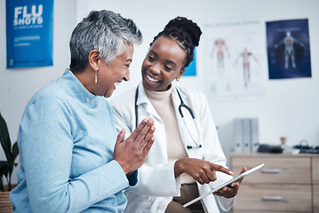 Image showing Black woman, doctor and elderly patient with good news, tablet and results for health, advice and report. Happy african medic, mobile touchscreen or healthcare with smile, tech or support in hospital