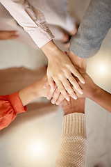 Image showing Team building, top view or hands in meeting together on a business or group project for motivation. Diversity, mission or employees in collaboration for our vision, strategy planning or target goals