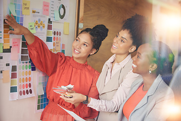 Image showing Teamwork, board or fashion meeting for planning clothing, new colors or boutique clothes in collaboration together. Happy, women or creative designers speaking or working on group ideas or strategy