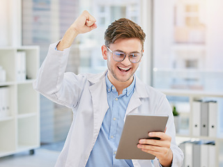 Image showing Success, medical and tablet with doctor in hospital and cheering for celebration, report or achievement. Winner, research and technology with man reading good news for healthcare, medicine or science