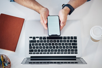 Image showing Above, phone screen and laptop by hands of man with mockup for advertising and space. Smartphone, display and business influencer online for blog, financial and advice, freelance and remote work