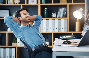 Image showing Happy business man stretching to relax from easy project, complete achievement and happiness in office. Worker, smile and hands behind head to finish tasks, rest and break for productivity at desk