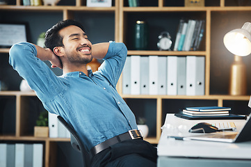 Image showing Happy business man, eyes closed and stretching to relax from easy project, dream and happiness in office. Worker, smile and hands behind head to finish tasks, rest and break for inspiration at desk