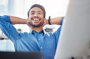 Image showing Happy man, thinking and stretching in office to relax for motivation, positive mindset or happiness. Worker, smile and hands behind head for mental health break, finish tasks and inspiration of goals