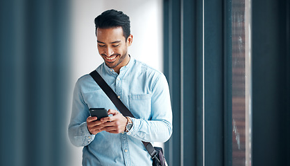 Image showing Professional man with smartphone, communication with typing or scroll through social media with smile. Young male, creative at startup and technology, contact and network with happy and reading text
