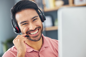 Image showing Smile, consulting and portrait of an Asian man in a call center for online communication. Happy, contact us and a customer service agent working in telemarketing, talking and working in support