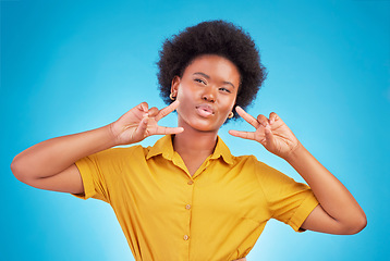 Image showing Happy, motivation and black woman with peace sign, inspiration and success against blue studio background. African American female, lady and hand gesture for emoji, silly and v symbol with happiness