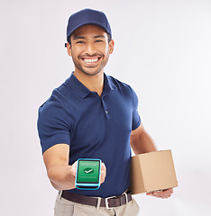 Image showing Payment, happy and a portrait of a man doing a delivery isolated on a white background in a studio. Retail, ecommerce and an Asian courier with a card machine for a package, box and shipment