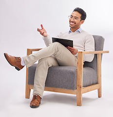 Image showing Asian man, therapist and chair with clipboard in session isolated against a white studio background. Happy male psychologist or consultant in therapy, counseling or mental health solution on mockup