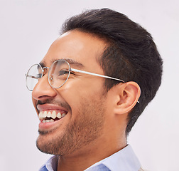 Image showing Face, glasses and vision of happy man with a smile and new frames, eyewear and spectacles isolated in a studio white background. Head, optometry and excited young male person for eyecare