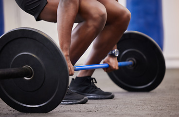 Image showing Black man hands, barbell and weights training of a bodybuilder in a fitness gym. Exercise, workout and muscle of a African athlete doing sports, power deadlift and hard challenge in a health club