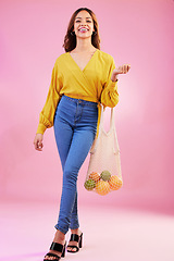 Image showing Shopping, portrait and woman nutritionist with fruit in studio for health, diet and healthy living on pink background. Face, groceries and happy girl customer with organic product, nutrition or detox