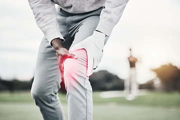 Image showing Sports, injury and golf course, black man with knee pain at game, massage and relief in health and wellness. Green, zoom on hands on leg in support and golfer with ache at golfing workout on grass.