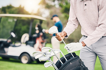 Image showing Golf, choose club and hands of man with golfing bag to start game, practice and training for competition. Professional golfer, activity and male caddy with clubs for exercise, fitness and recreation