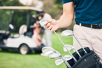 Image showing Golf, choose club and hands of man with bag on course ready to start game, practice and training for competition. Professional golfer, golfing and male caddy for exercise, fitness and recreation