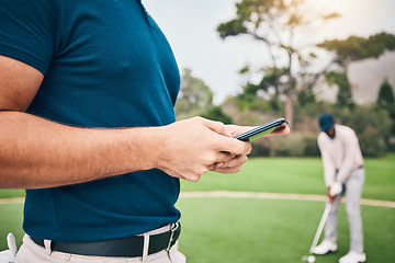 Image showing Man, hands and phone texting in communication on golf course for sports, social media or networking outdoors. Hand of sporty male chatting on smartphone or mobile app for golfing research or browsing