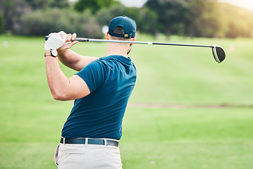 Image showing Golf stroke, sport swing and golfer outdoor for game, fitness and exercise on grass. Athlete back, training and man at a sports club for cardio and workout on a green course with focus and action